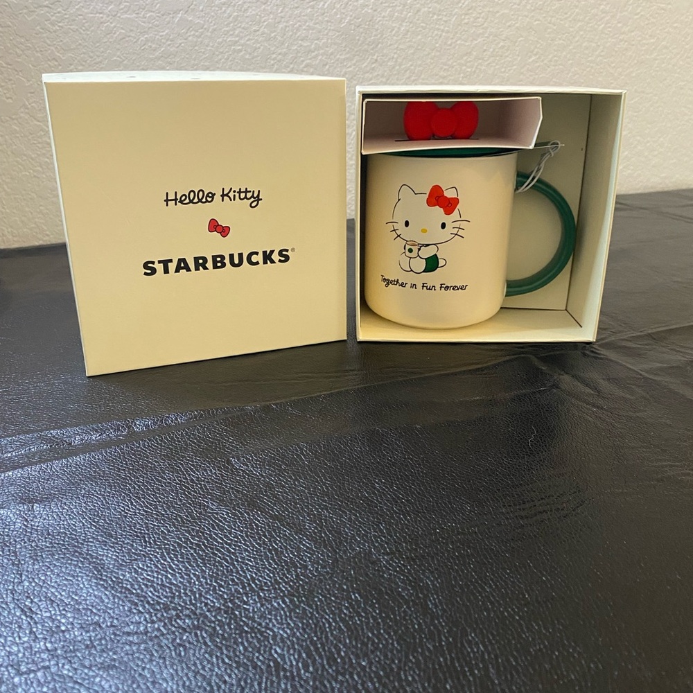 Starbucks Hello Kitty Mug with Red Bow and Green Handle